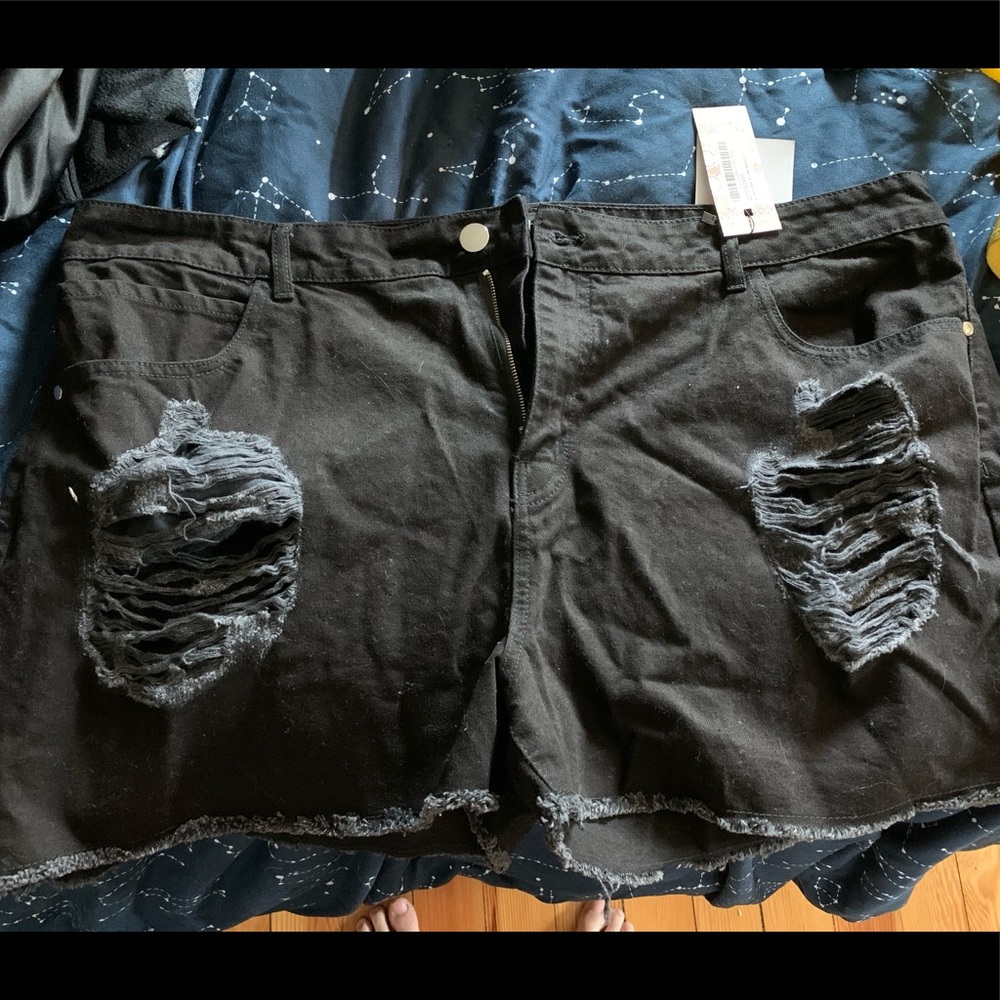 Distressed black shorts